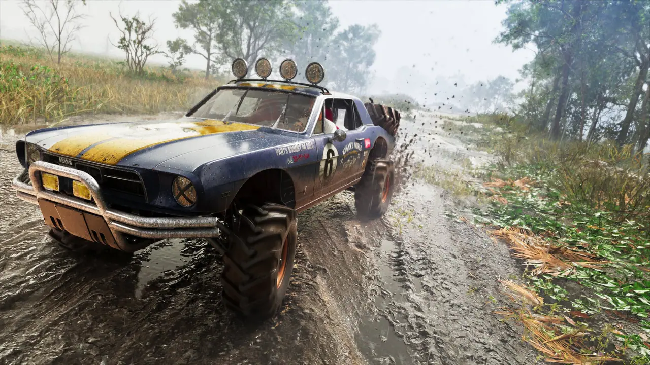 The '67 Vapid Dominator Buggy with roof lights splashing along a muddy forest track