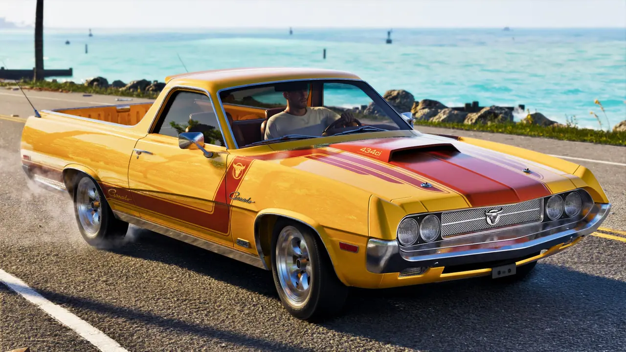 The yellow Vapid Ganado pickup with the Retro Build mods on a coastal road